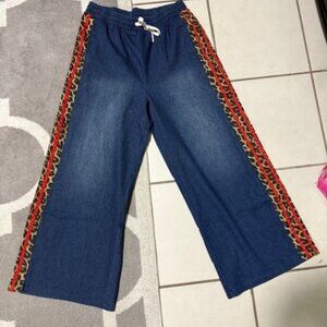 High End Boutique Brand Pull String Blue Jeans with Cheetah print Sz M NWT